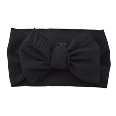 Koolgil baby girls 8-inch soft bow headband shown for comfortable all-day wear.