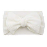 Koolgil Baby Headband Ivory Bow on child for photography sessions.