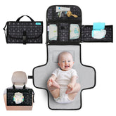 Kopi Baby portable diaper changing pad front view demonstrates a compact travel-ready surface for on-the-go changes.