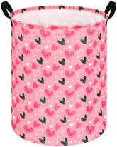 KUNRO Round Heart Laundry Basket with waterproof lining for easy cleanup.