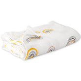 Kvoike Rainbow Muslin Swaddle Blanket laid flat for a cozy nap