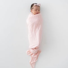 KYTE BABY Ballet swaddle blanket close-up reveals woven stripe detail and texture.