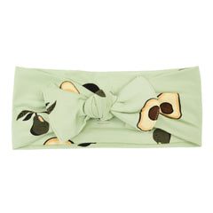 KYTE BABY bamboo bow avocado front view shows gentle stretch for comfy fit.