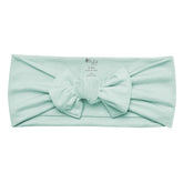 KYTE BABY bamboo bow sage back view highlights adjustable stretch for secure, gentle fit.