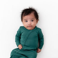 KYTE BABY Bundlers emerald fabric close-up highlights bamboo softness.
