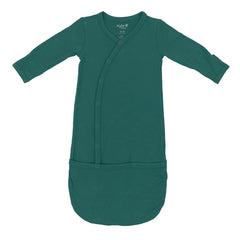 KYTE BABY Bundlers emerald sleeper gown with snaps for quick diaper changes.
