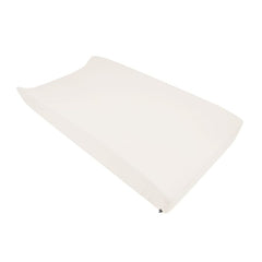 Kyte Baby change pad cover in oat bamboo rayon feels silky and stretchable for diaper changes.