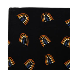 Kyte Baby crib sheet Rust Rainbow on Midnight full sheet on mattress highlights 28x52 standard size.