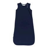 KYTE BABY sleep bag navy side view showing relaxed leg position for comfortable sleep