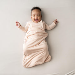 KYTE BABY sleep bag porcelain zipper for easy diaper changes.