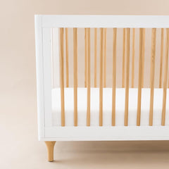 Kyte Baby Soft Crib Sheet Cloud demonstrates secure elastic edges for a snug fit