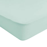 Kyte Baby soft crib sheet sage fabric closeup emphasizes breathable bamboo rayon for comfort