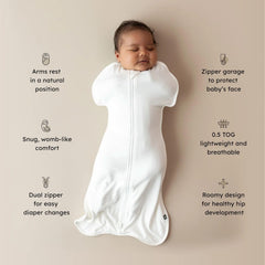 KYTE BABY Swaddle Cloud 0.5 On Baby—secure, natural arm position for calm sleep.