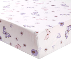 La Premura pastel butterflies and watercolor florals create a soothing nursery ambiance.