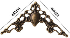 Labriciyon antique bronze corner protector used on scrapbook corner for elegant detailing.