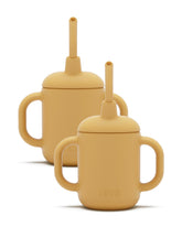 Lalo Little Cup 2-Pack handles—easy grip for tiny hands, supporting independent sipping.