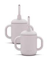 Lalo Little Cup 2-Pack lavender side view shows soft handles for tiny hands and easy grip.