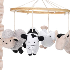 Lambs & Ivy Farm Animals mobile in sleep scene supports visual and auditory stimulation.