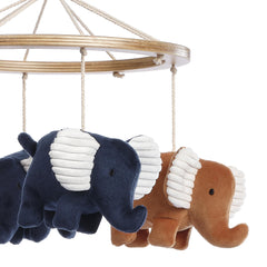Lambs & Ivy caramel elephants closeup highlights gentle movement and visual contrast.