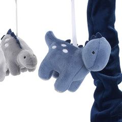 Lambs & Ivy dino mobile rotation image illustrating spinning motion for soothing baby