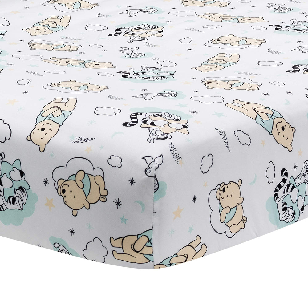 Lambs & Ivy Winnie the Pooh Hugs crib sheet features Pooh, Tigger, and Piglet for cozy nursery.