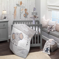 Lambs & Ivy Jungle Safari Elephant quilt applique adds cozy nursery focal point.