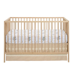 Lambs & Ivy Jungle Story safari animals design adds vibrant coordination to nurseries.