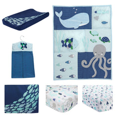 Lambs & Ivy Oceania fitted sheet close-up showing soft cotton and secure fit for crib
