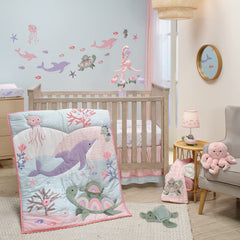 Lambs & Ivy Sea Dreams crib sheet seahorses artwork complements ocean-themed nursery
