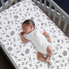 Lambs & Ivy Star Wars Darth Vader print showcases iconic design for themed nurseries.
