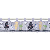 Lambs & Ivy Star Wars valance featuring Yoda for playful space-themed bedroom decor.