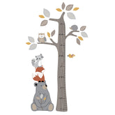 Lambs & Ivy woodland tree growth chart decal forest scene enhances playful wall decor and milestone tracking.