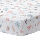 Lambs Ivy Baby Blooms sheet shows flowers and butterflies for gentle crib sleep