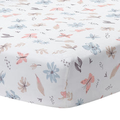 Lambs Ivy Baby Blooms sheet shows flowers and butterflies for gentle crib sleep