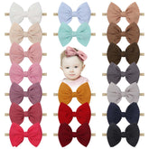 Lanmerry baby bow headband 4.5-inch close-up shows soft nylon for gentle comfort.