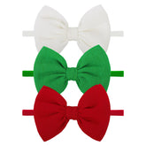 Lanmerry Christmas baby bows on green headband offering newborn comfort.