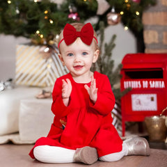 Lanmerry red hair bow on nylon headband provides secure fit for toddlers.