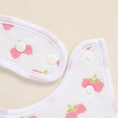 LazyRhino baby bib worn on a baby during feeding and teething.