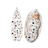 Lcokin cow-print swaddle blanket close-up shows soft texture for newborn comfort.
