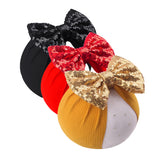 LDDCX glitter bows headband front view, sparkly gold red black for adorable baby photos.