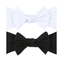 LemonSpace bow-headband closeup showing soft stretchy fabric and secure fit.