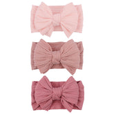 LemonSpace baby headband in pink soft fabric for gentle daily wear.