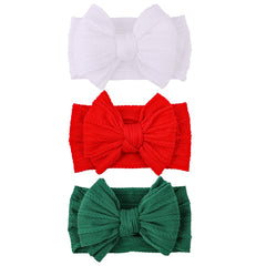 LemonSpace baby headband red bow closeup; soft, breathable wear for delicate skin.