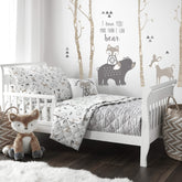 Levtex Baby Bailey Bear quilt close-up showing neutral woodland print for cozy naps.