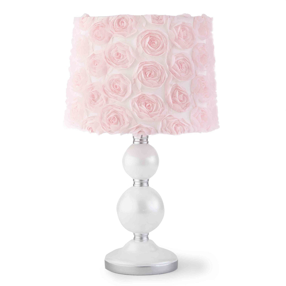 Levtex Baby Elise table lamp with spindle base provides gentle nursery lighting for bedtime routines.