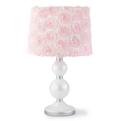 Levtex Baby Elise table lamp with spindle base provides gentle nursery lighting for bedtime routines.