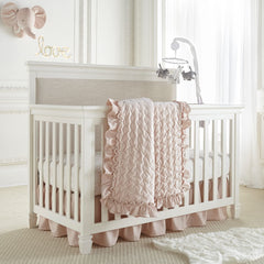 Levtex Baby Heritage quilt blush velvet texture adds luxurious focal point to crib