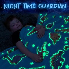 Liderstar dinosaur blanket blue color on a kid's bed for comfort.