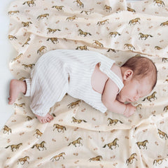 LifeTree swaddle with leaf pattern offers breathable bamboo-cotton fabric for gentle skin contact.