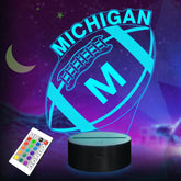 Lightzz 3D Football Michigan Night Light base offers vibrant color shifts for cozy bedside ambiance.